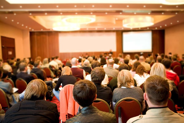 people attending a conference