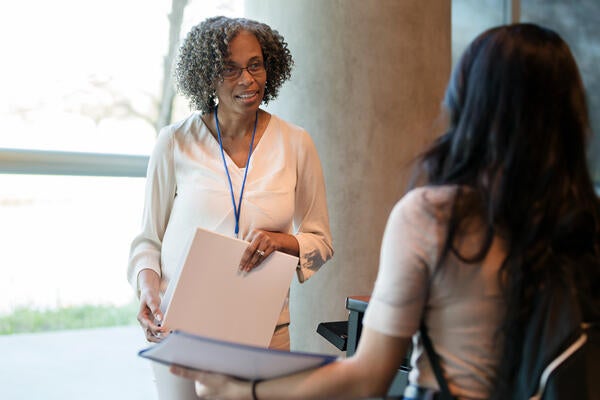 professor speaking with student