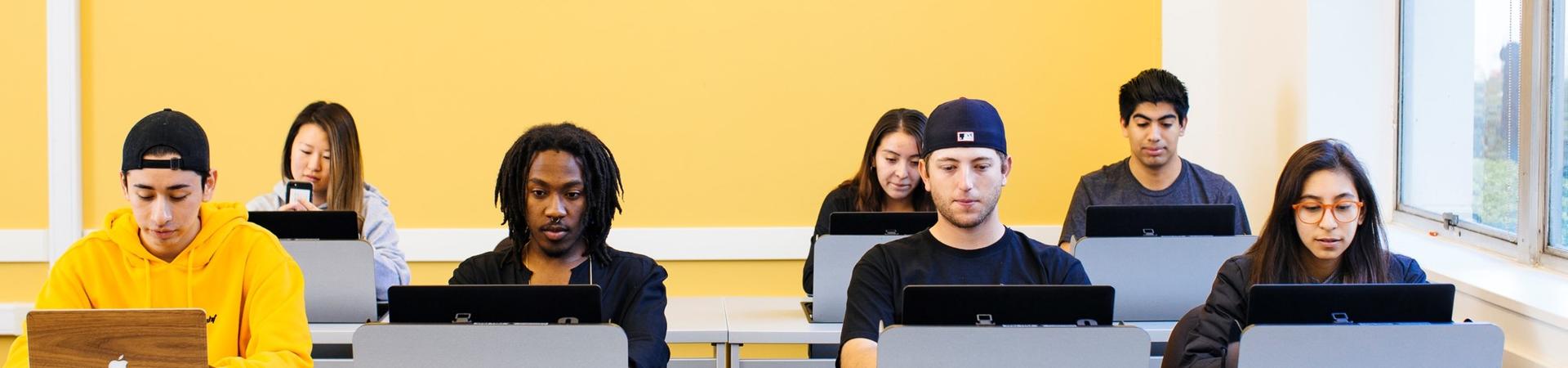 students at laptops